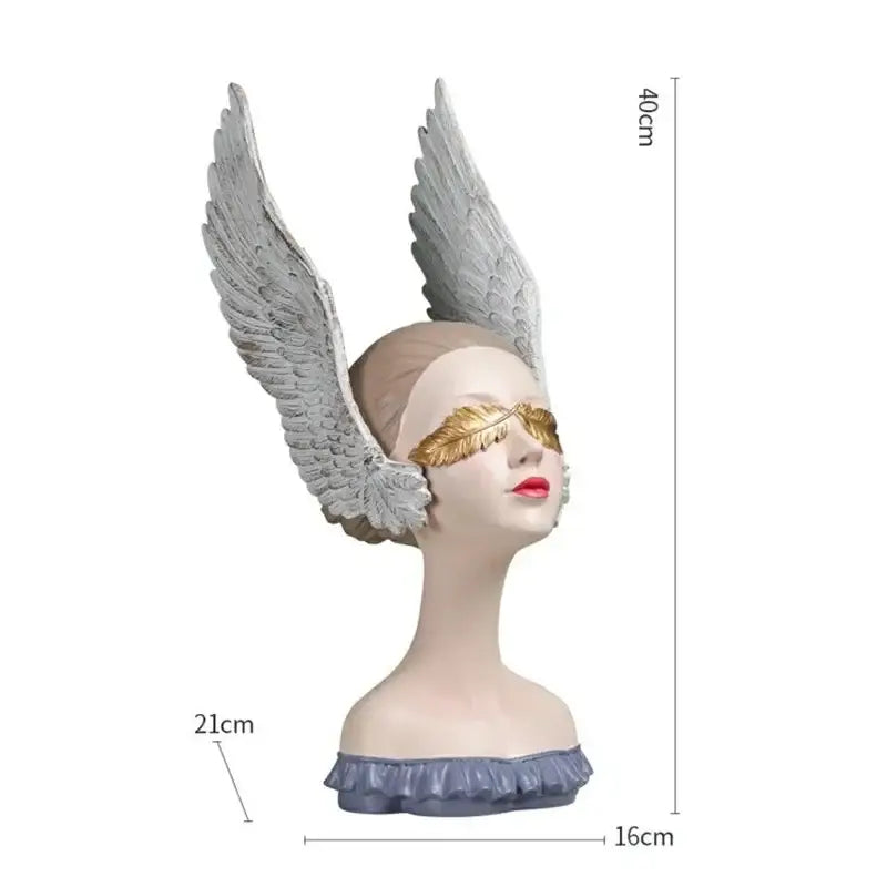 Decorbites™ angel girl statue with silver wings, gold leaf eye mask, red lips, and ruffled blue base for room decor