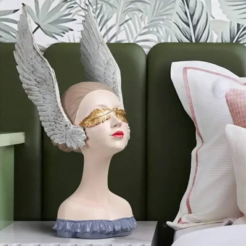 DecorBites™ angel girl statue with silver wings golden leaf blindfold red lipstick blue ruffled room decor sculpture