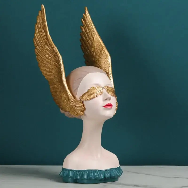 DecorBites angel girl statue with golden wings, pale face, red lips, and teal ruffled base for room decor