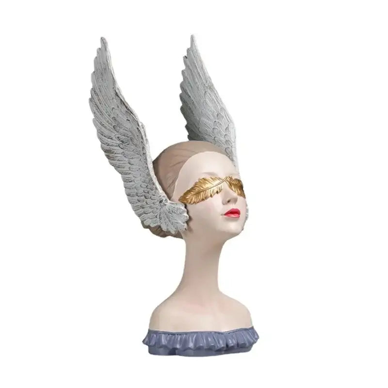 Sculpted angel girl statue with silver wings, golden leaf mask, and red lips for elegant room decor and gifts