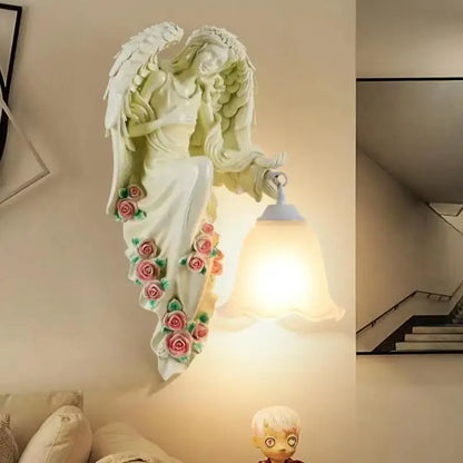 DecorBites angel indoor wall light led gold resin sconce with white sculpted wings and soft glowing bell shade