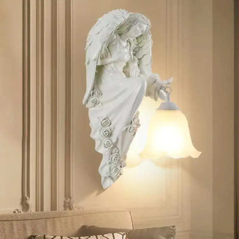 White angel indoor wall light led gold resin sconce with sculpted wings and rose details featuring a soft glowing lampshade