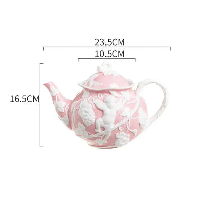 Pink porcelain teapot with white angel relief ceramic detailing of cherubs and foliage from decorbites relief ceramic tableware set