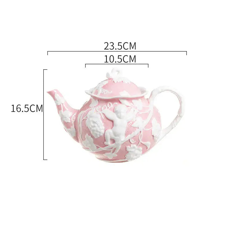 Pink porcelain teapot with white angel relief ceramic detailing of cherubs and foliage from decorbites relief ceramic tableware set
