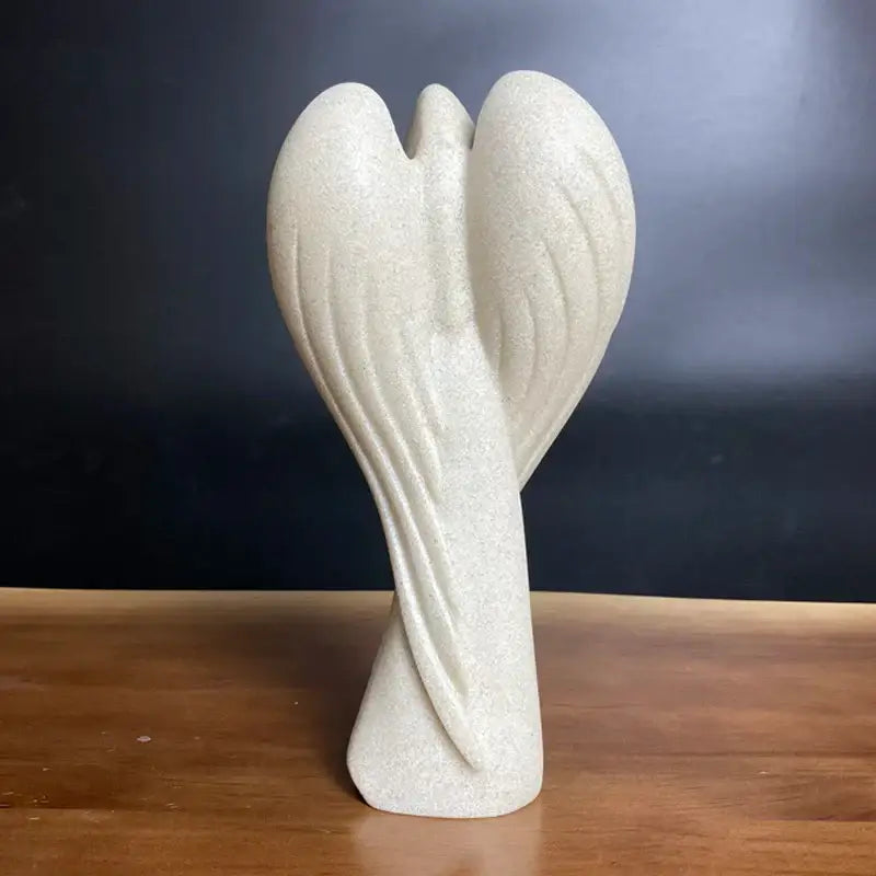 Decorbites™ angel wing girl resin statue featuring a smooth off-white textured angel wing for home decor