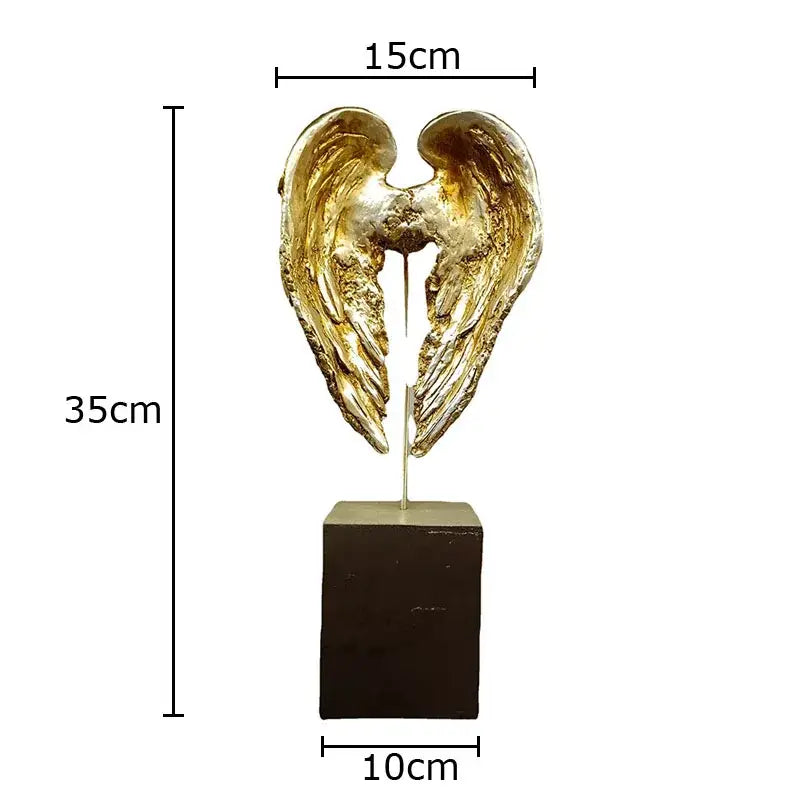 Decorbites™ golden angel wings sculpture with textured metallic finish on dark brown base wings sculpture desk decor