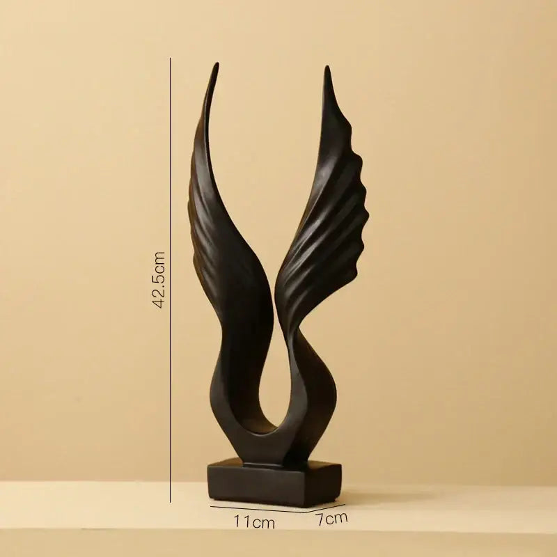 Black resin DecorBites™ angel wings sculpture with sleek modern design for Nordic abstract home decor artware
