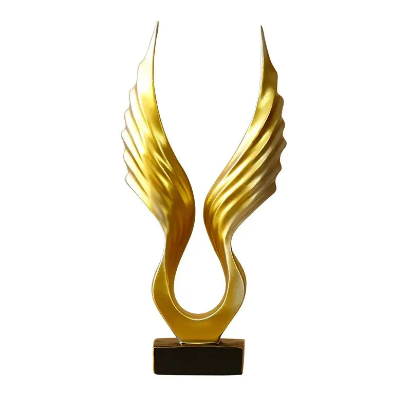 DecorBites™ angel wings sculpture with golden polished resin and sleek curves on a dark rectangular base