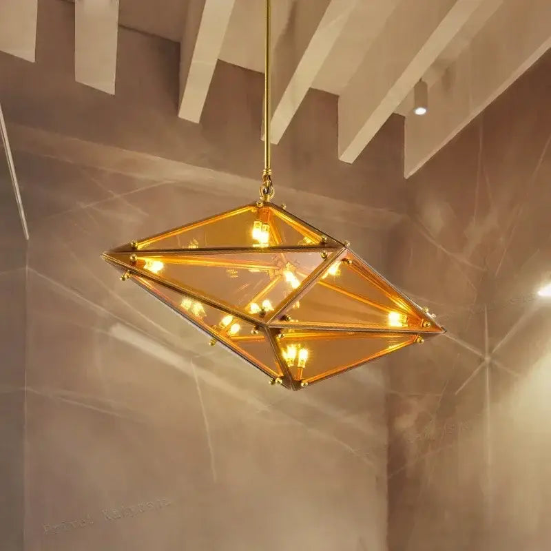 Golden angular diamond glass chandelier with amber-tinted panels and brass hardware for home decor ceiling light