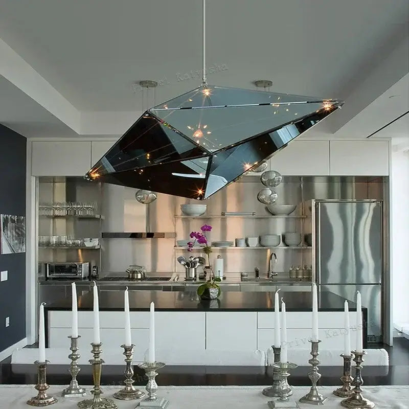 A sleek DecorBites™ angular diamond glass chandelier ceiling light with mirrored dark reflective facets hangs from ceiling