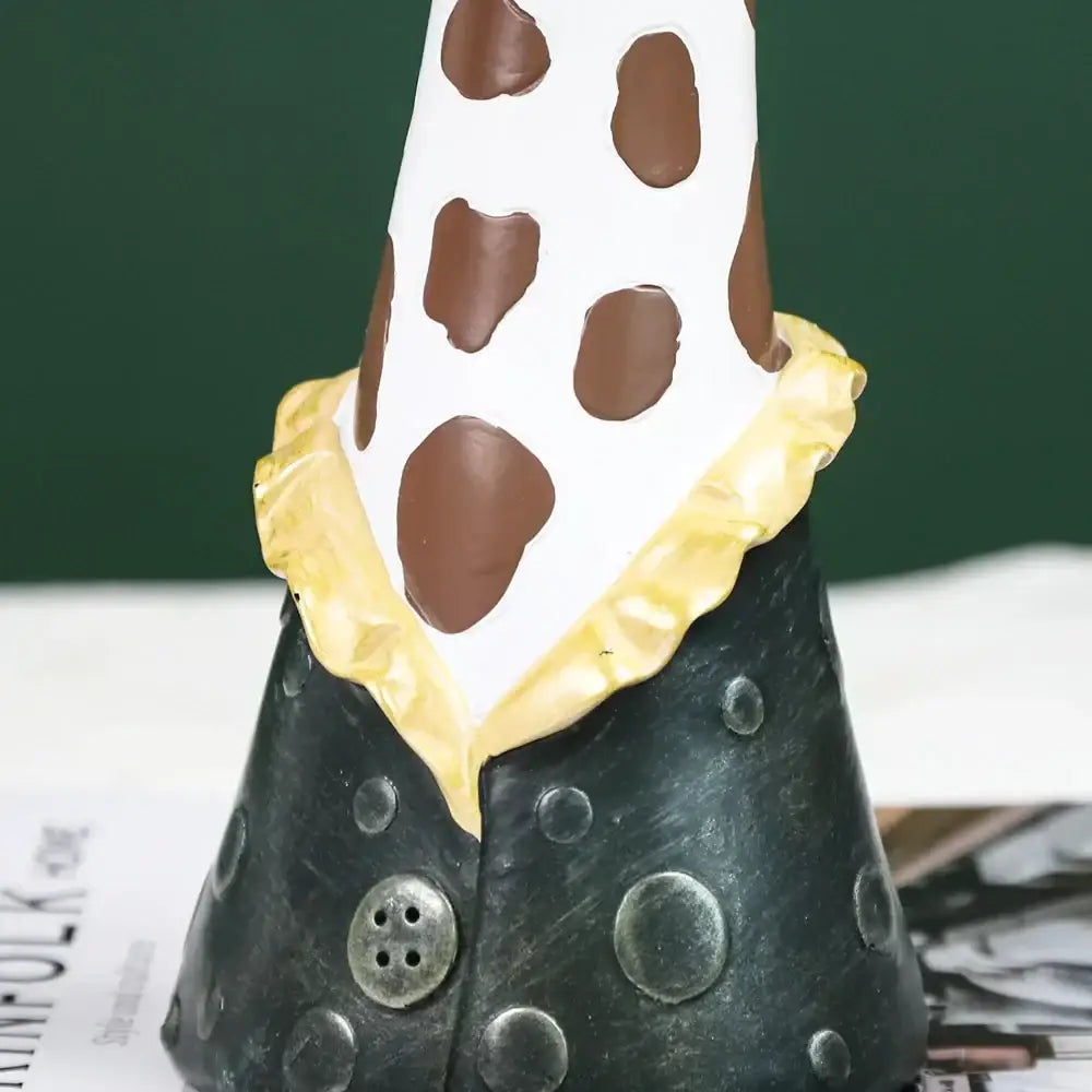Whimsical black and white cow-patterned animal bust succulent vase with yellow ruffled collar hand-painted resin figure