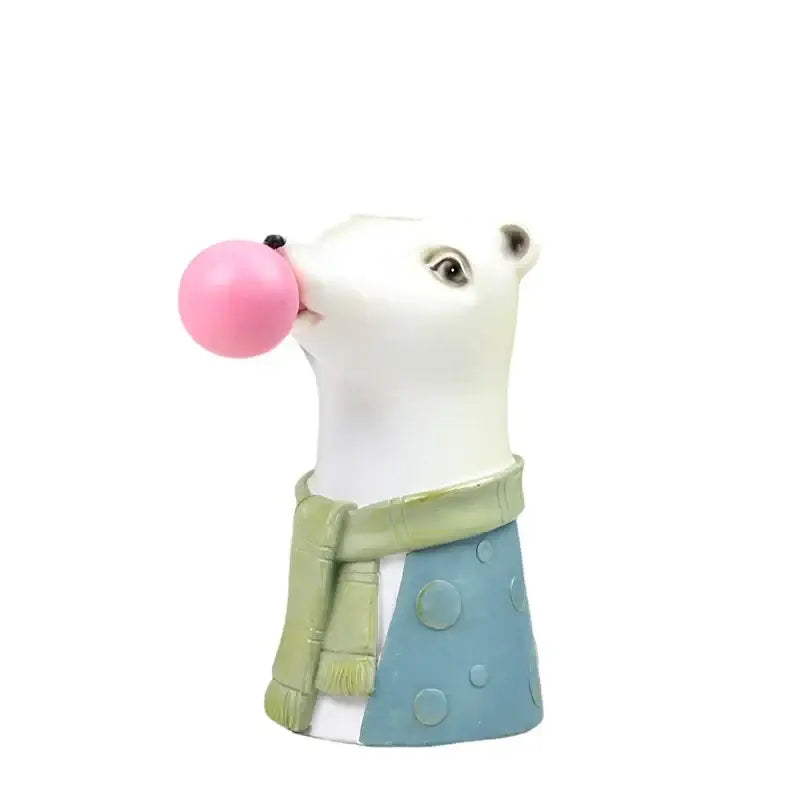 White polar bear animal bust succulent vase in hand-painted resin wearing green scarf and blue polka-dot skirt blowing bubble gum