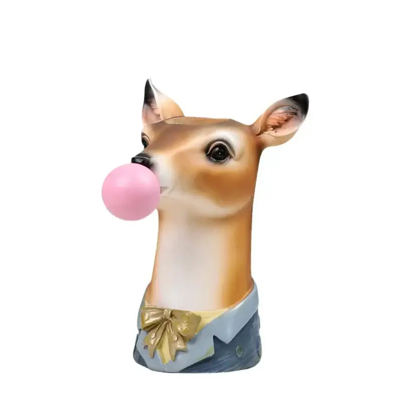 A hand-painted resin animal bust succulent vase featuring a tan and white deer in a blue shirt blowing pink bubble gum