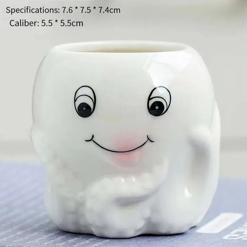 White ceramic planter shaped like a smiling tooth with black eyes and pink cheeks from DecorBites animal cartoon ceramic flowerpot collection
