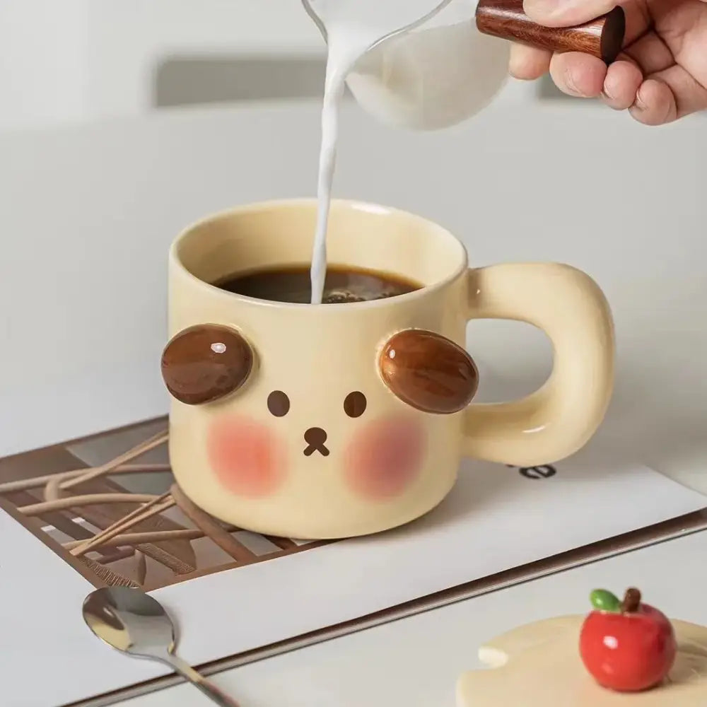 Cream-colored animal ceramic mug with brown glossy ear decorations and pink blush from DecorBites ceramic mug set