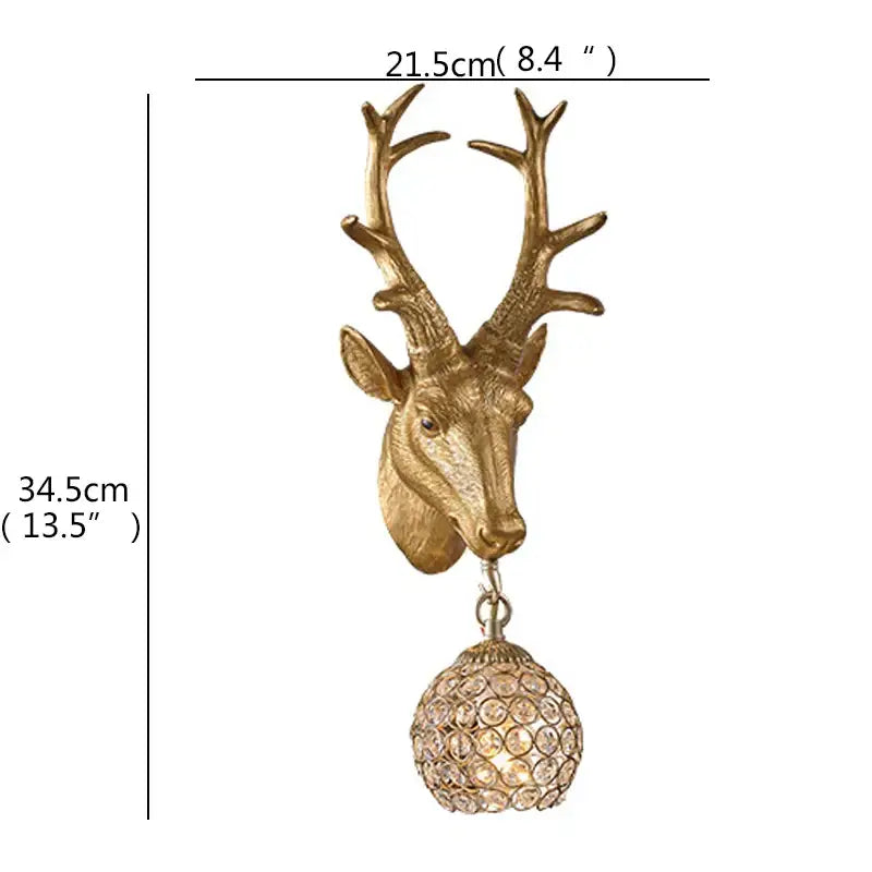 Gold-toned deer head led wall sconce with dangling crystal globe light for home bedroom decor by decorbites™