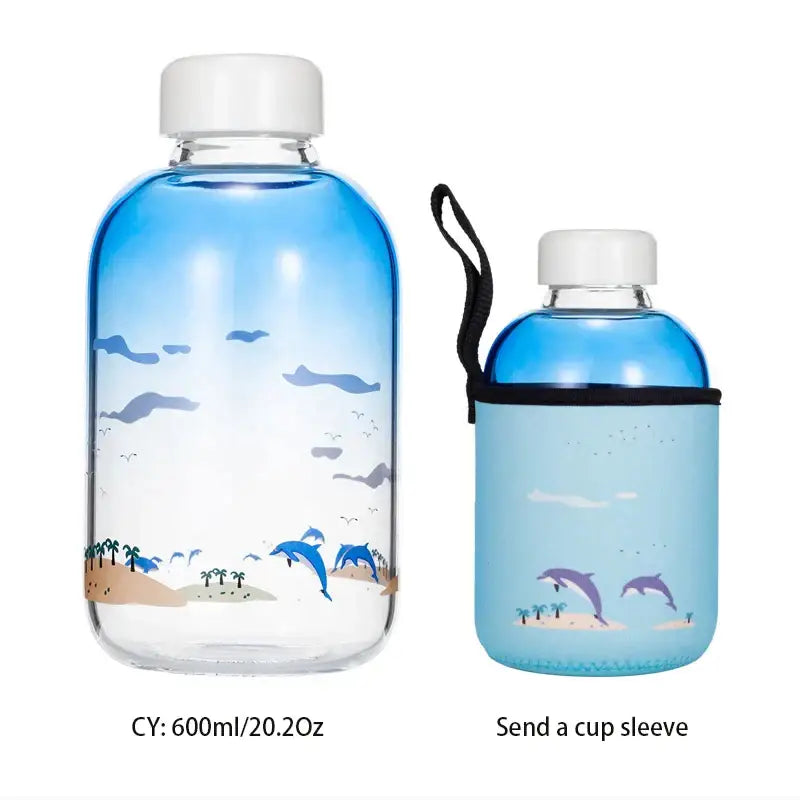Blue gradient glass water bottle with dolphin and beach scene illustration and white screw-on cap for outdoor use