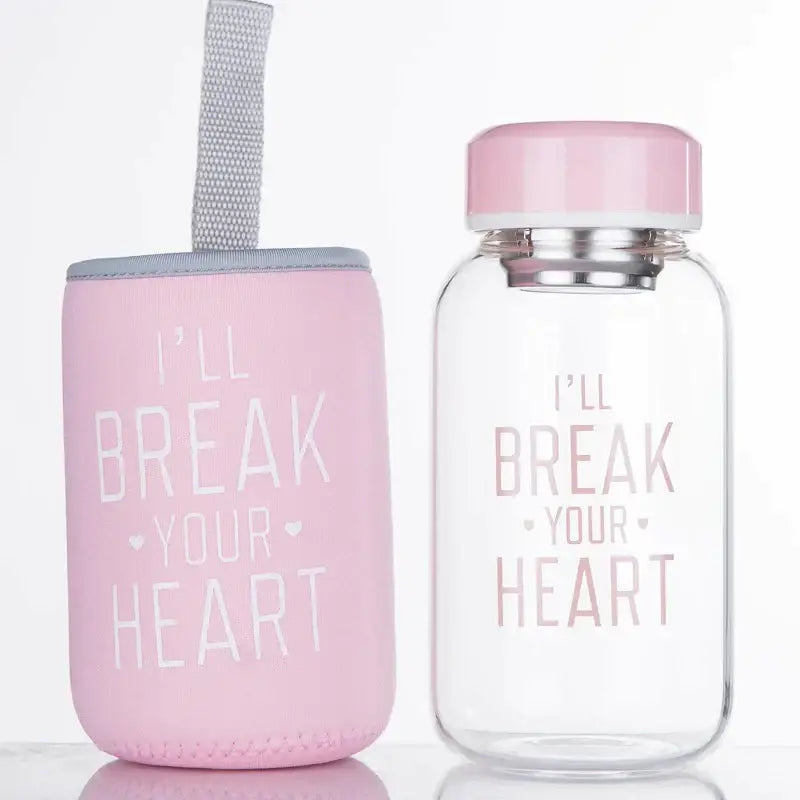 Decorbites™ animal glass water bottle with pink silicone sleeve and gray strap featuring heart design for outdoor use