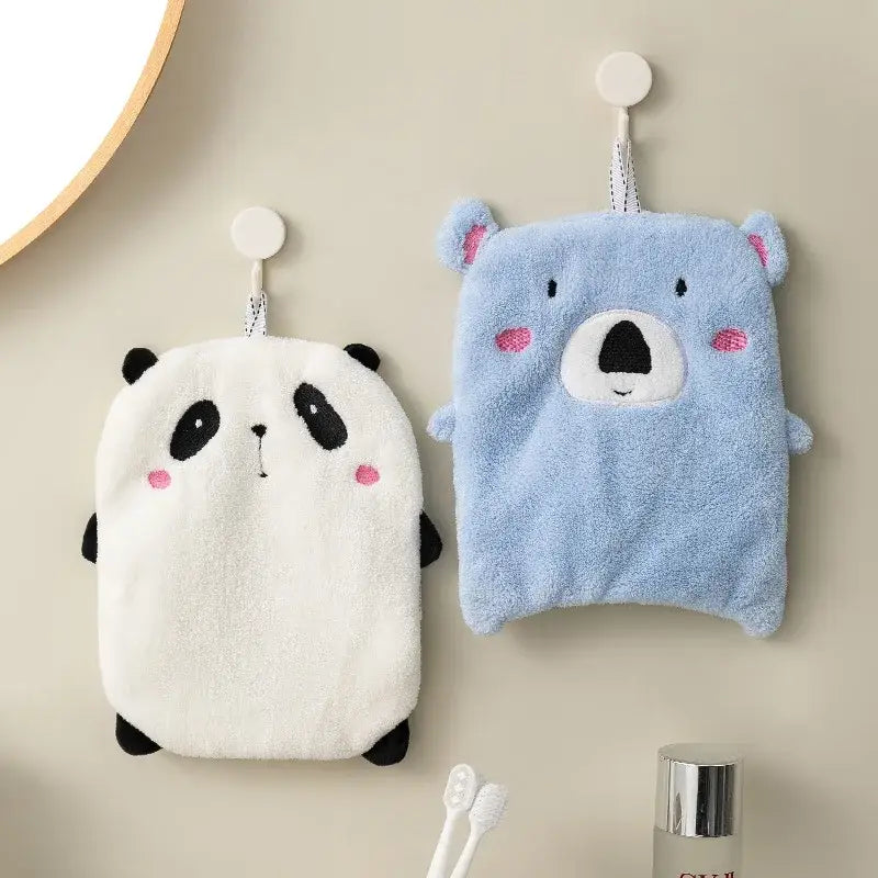 DecorBites™ animal hand towels featuring soft plush panda and koala designs with hanging loops in white and light blue