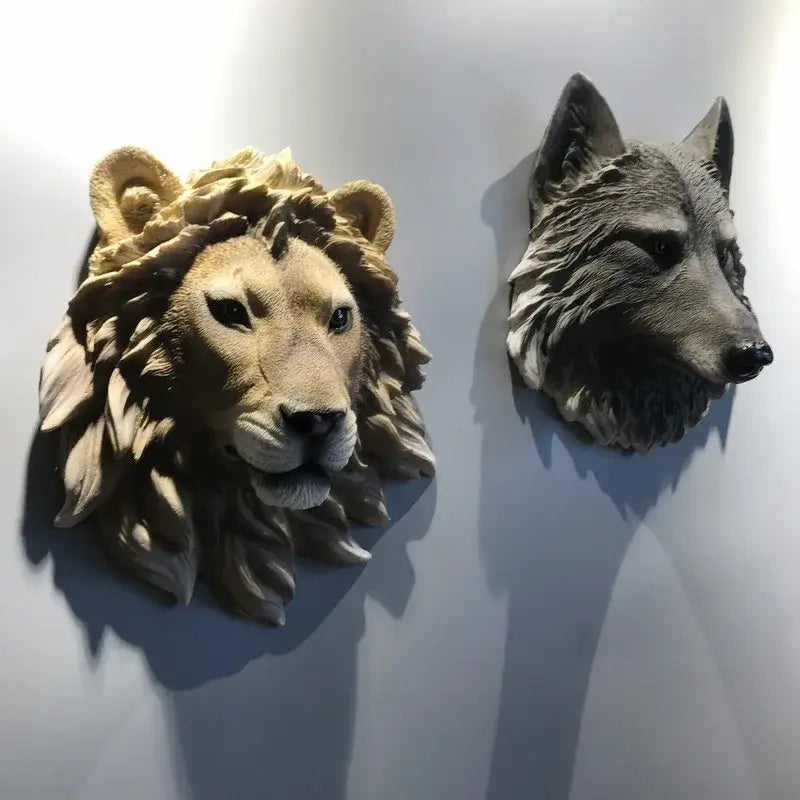 Detailed resin animal head wall featuring realistic lion and wolf fur textures in natural tan and gray tones