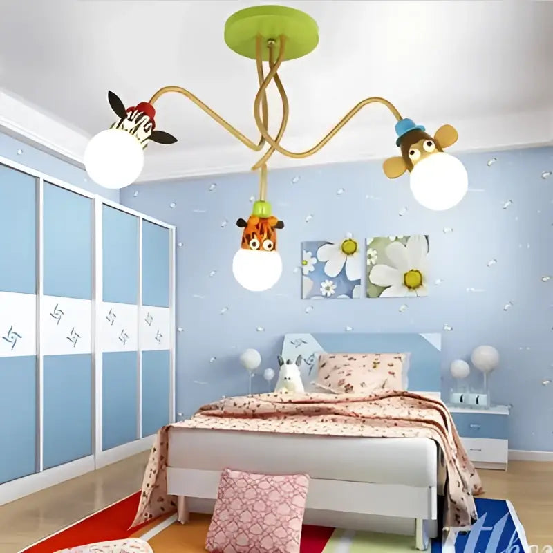 Decorbites green ceiling light with three arms featuring white globe bulbs and animal led ceiling heads zebra tiger bee