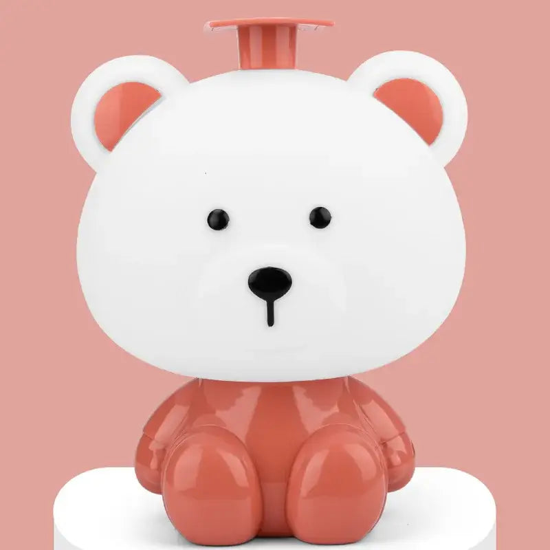Decorbites™ animal light bear-shaped liquid soap dispenser with white and coral colors and matching orange pump top