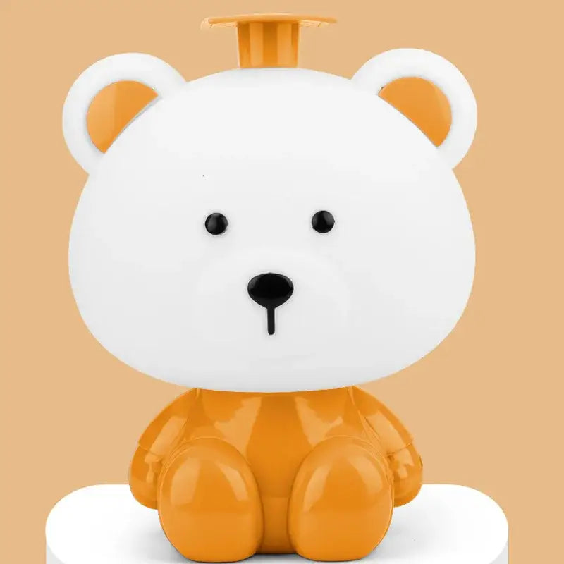 Cute white and orange bear shaped liquid soap dispenser with pump top complements DecorBites™ bear rabbit led animal light