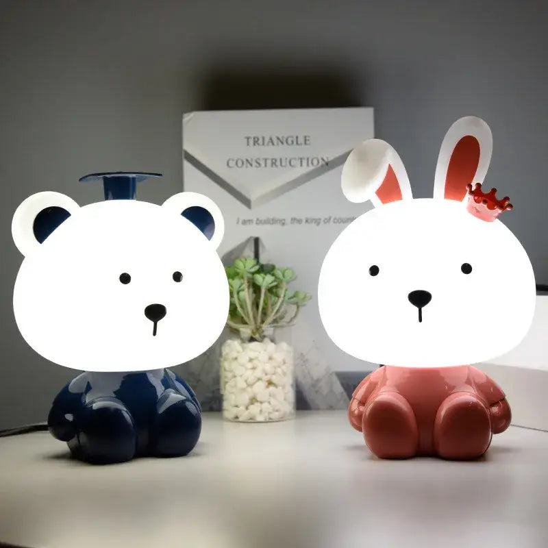 DecorBites™ animal light featuring navy blue bear led night light with graduation cap and coral pink rabbit light with crown