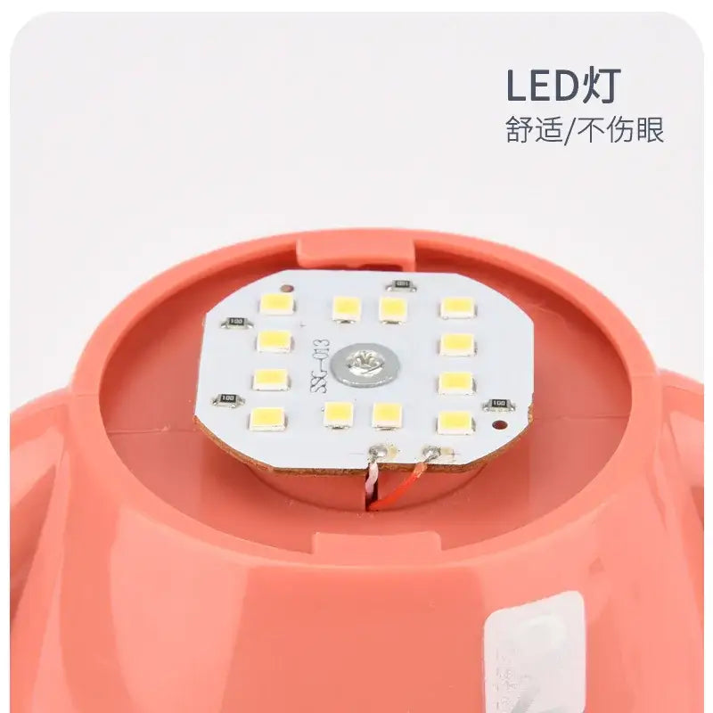Coral-colored plastic decorbites animal light with white circuit board featuring yellow square leds for night light use