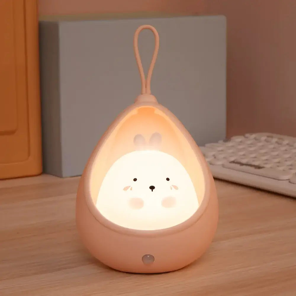 DecorBites™ soft peach silicone animal night light shaped like a bunny with gentle glow and USB rechargeable LED