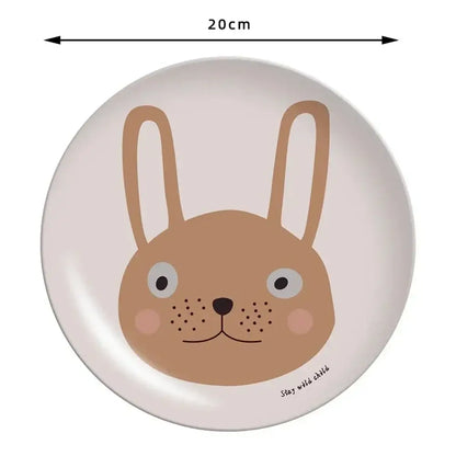 A 20cm round DecorBites™ bamboo fiber salad plate with a minimalist brown bunny animal print on off-white background