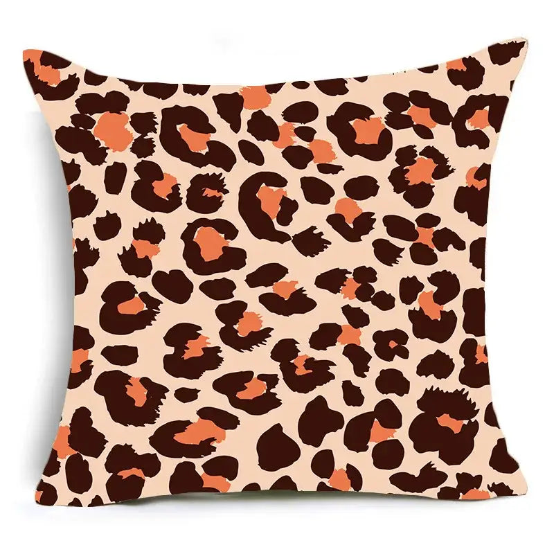 A square animal print pillowcase cushion cover with bold leopard print in dark brown orange on beige for sofa decor