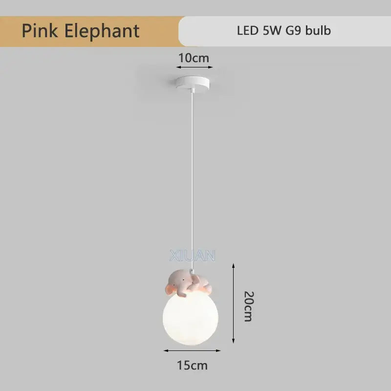 A charming pink elephant-shaped resin pendant lamp with a matte base and white cord for children’s rooms by decorbites