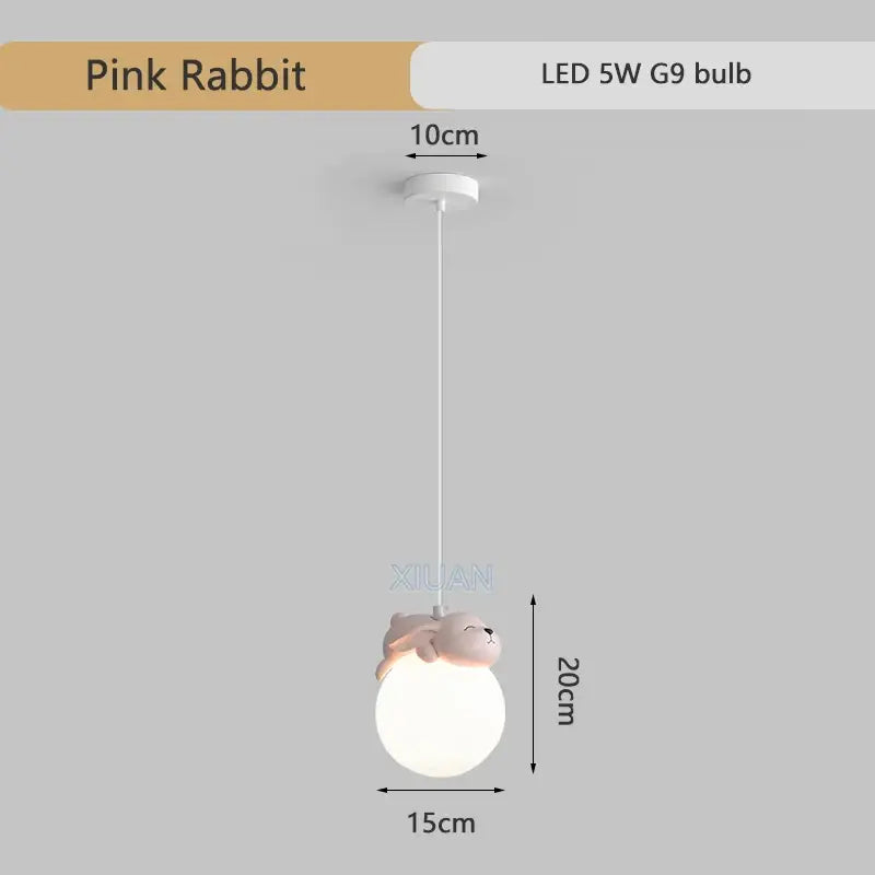 Pink rabbit-shaped resin pendant lamp with soft white spherical shade for children’s room by DecorBites pendant lamps
