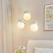 Three white spherical resin pendant lamps with gray plush bear accents from decorbites animal resin pendant lamps collection