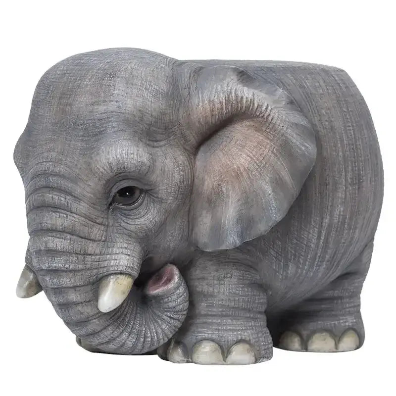 Gray elephant figurine with textured skin and pink inner ear animal resin sculpture footstool seat for living room
