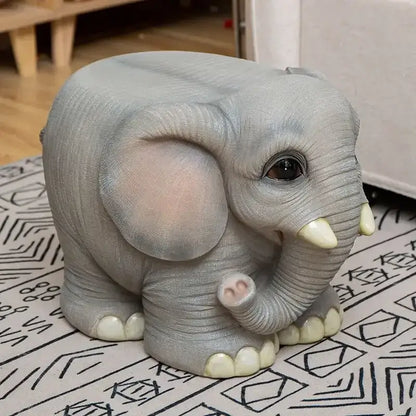 Gray elephant resin sculpture footstool seat with detailed textured skin and pink ears on patterned surface for living room