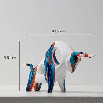 A sleek modern white animal resin statue with blue and orange abstract swirls from the DecorBites resin statue collection