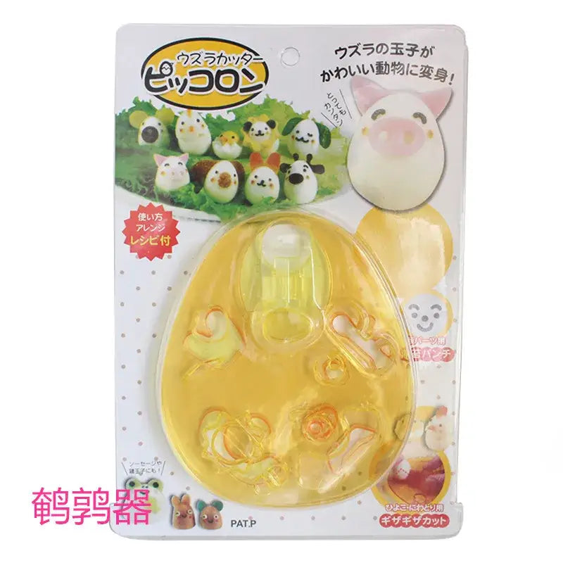 Yellow translucent plastic egg-shaped mold from decorbites mold set for shaping animal shape sushi rice in bento meals