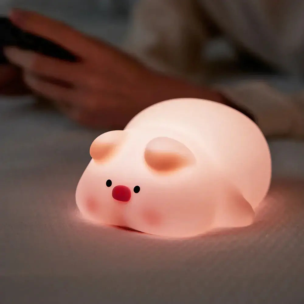 Soft pink plush pig-shaped animal silicone night light with warm glow usb rechargeable timer for kids bedside use