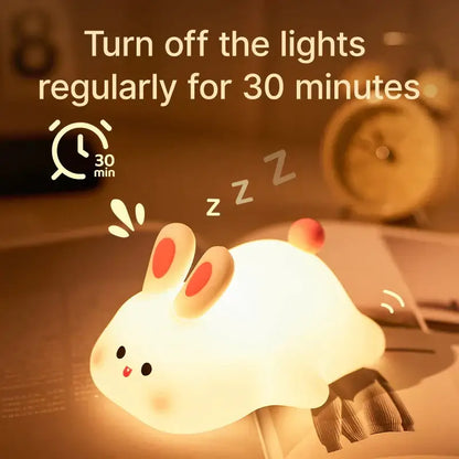 Decorbites™ animal silicone night light shaped like a cute white rabbit with red inner ears and soft glowing illumination