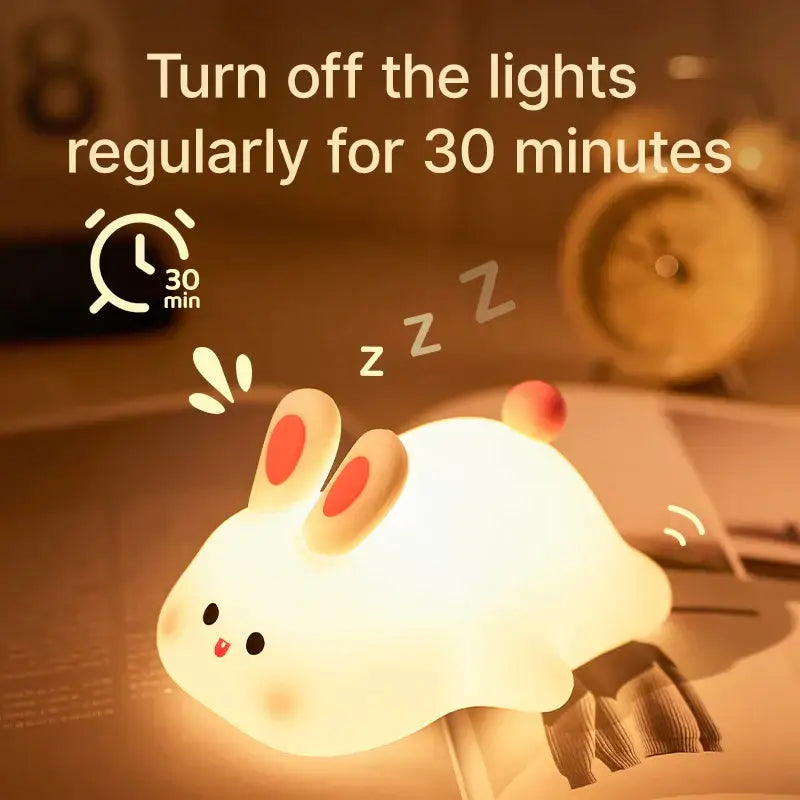 Decorbites™ animal silicone night light shaped like a cute white rabbit with red inner ears and soft glowing illumination