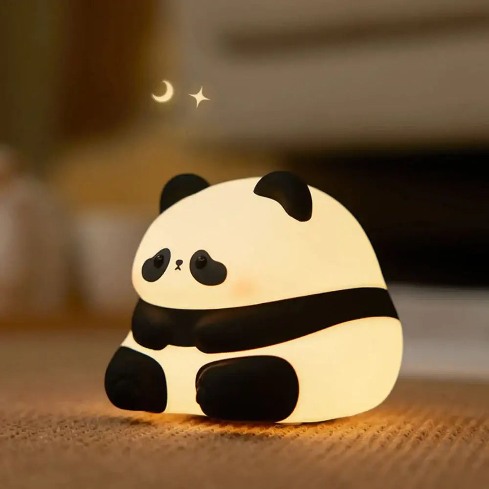 Decorbites™ animal silicone night light shaped like a cute black and white panda with soft glowing illumination