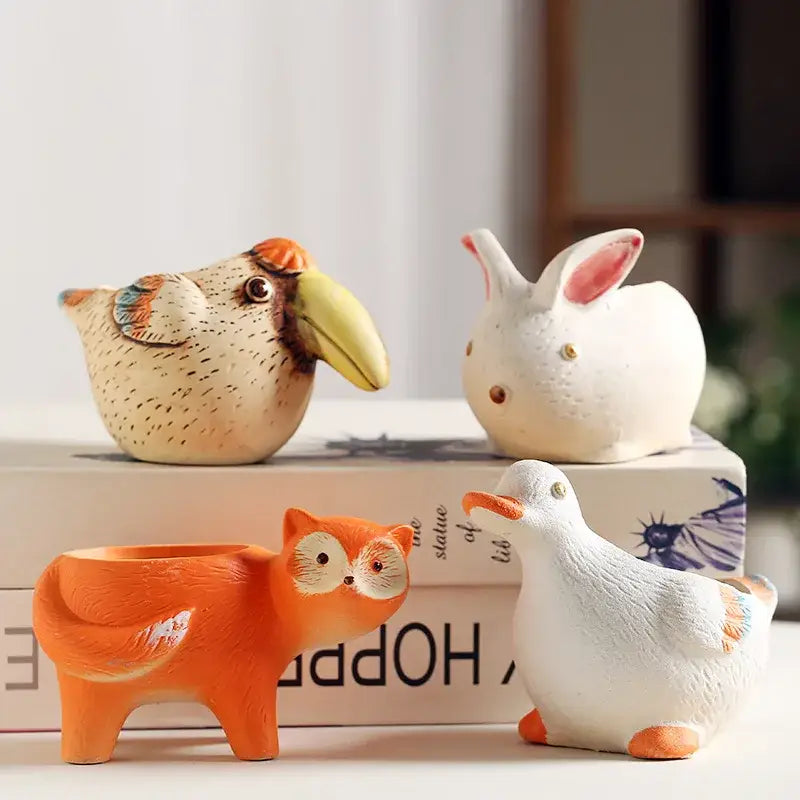 Cute ceramic decorbites™ animal vase succulent pots in pastel and orange with detailed painted rabbit and duck designs