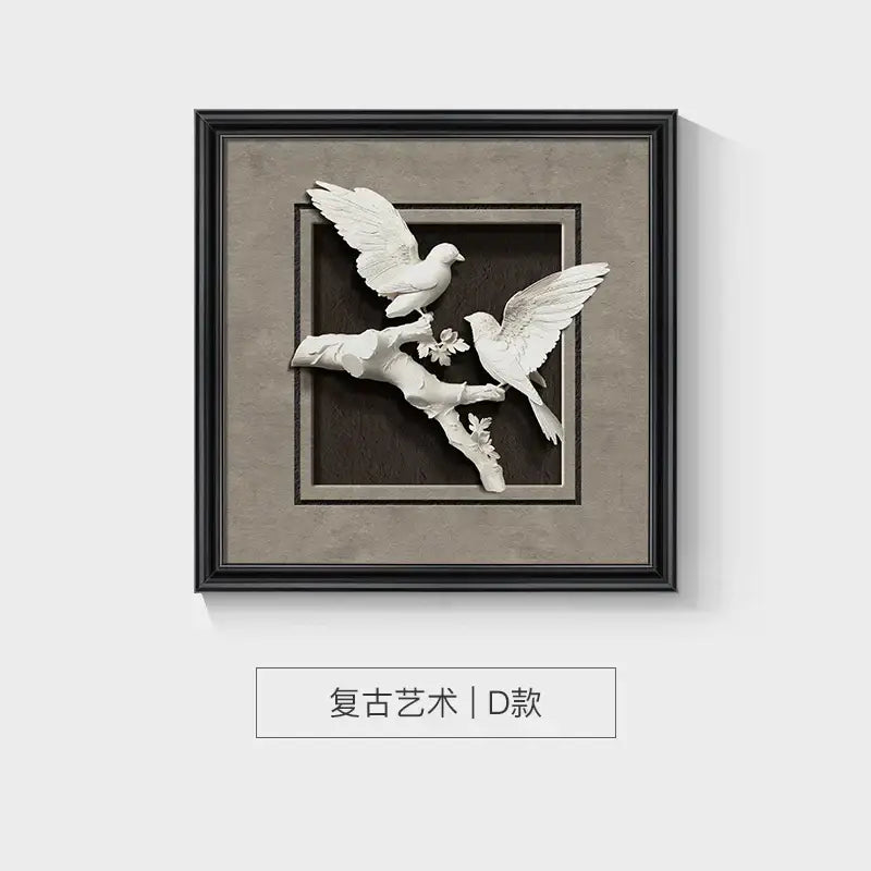 White sculptural animal wall decor with two doves and blossoms in a sleek black wall decor frame set by DecorBites™