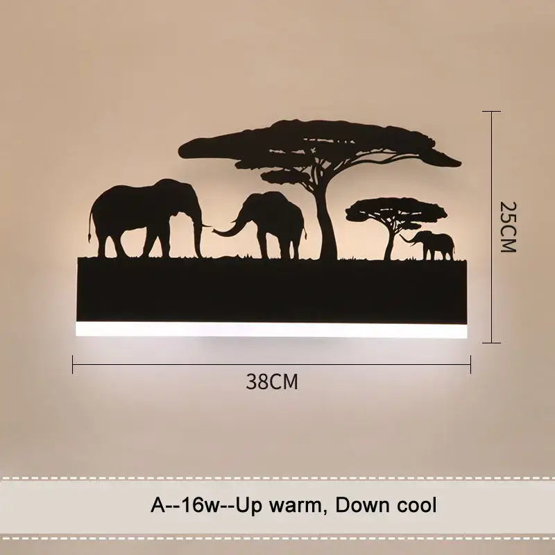 Black silhouette animal wall lamp by DecorBites featuring african savanna design with elephants and acacia trees