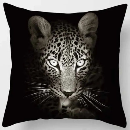 Black throw pillow case from decorbites animals world featuring a black and white leopard face with glowing eyes for living room