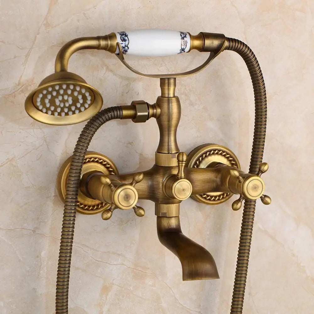 DecorBites antique brass shower mixer set with ceramic handle featuring blue floral patterns and three ornate knobs