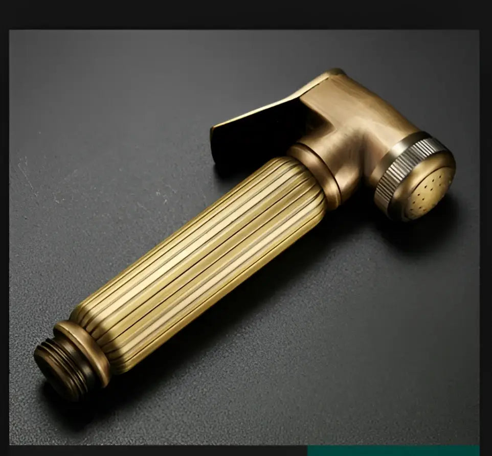Decorbites antique bathroom handheld shower head with brass-colored ribbed nozzle and adjustable spray settings for high pressure