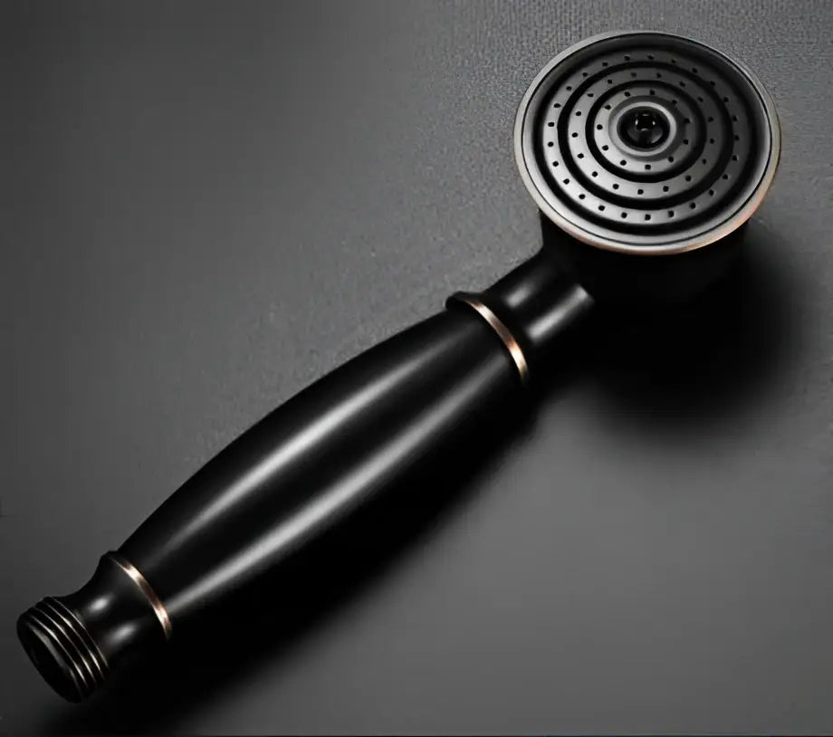 Black matte DecorBites antique bathroom handheld shower head with circular spray face and metallic accents for high pressure use